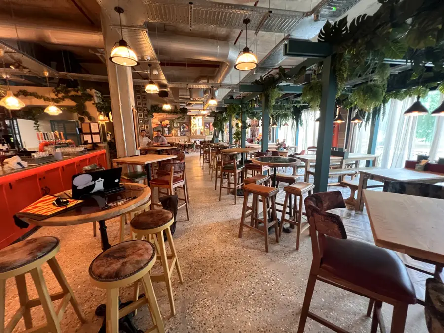 Exposed aggregate polished concrete floor at The Dock House restaurant, Brentford