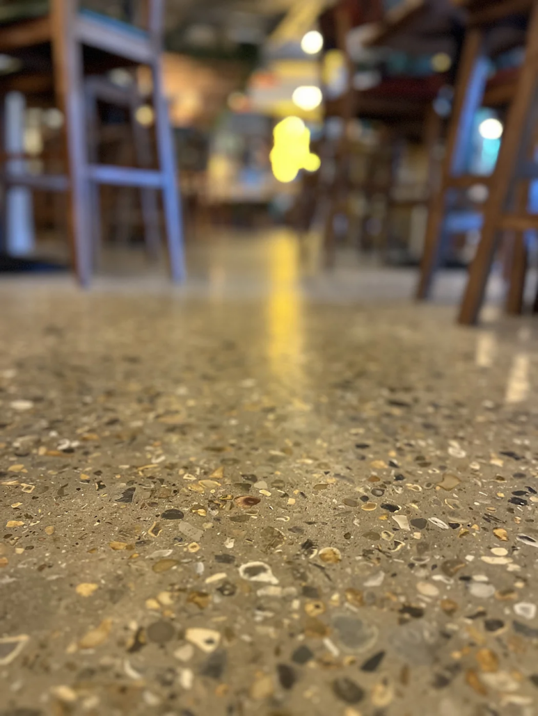 Exposed aggregate detail, polished concrete floor at The Dock House, Brentford