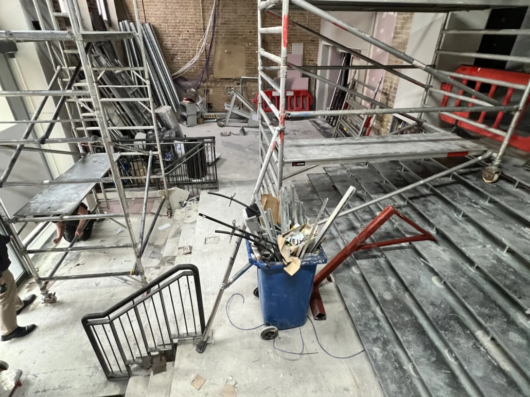 Before: the space in scaffold during fit-out — Lotus Cars London HQ