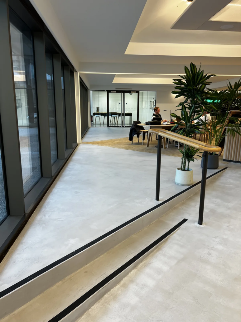 Balcony walkway in microcement — The AA HQ, Basingstoke