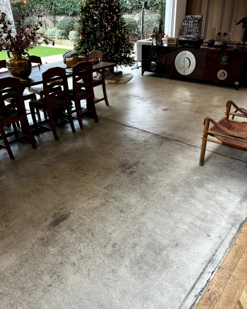 Worn, poorly installed polished concrete floor before Hardcrete resurfacing, Chiswick home