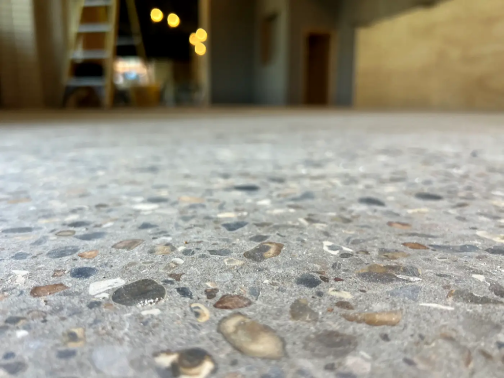 Exposed aggregate polished concrete floor at Always Gladice, Brent Cross