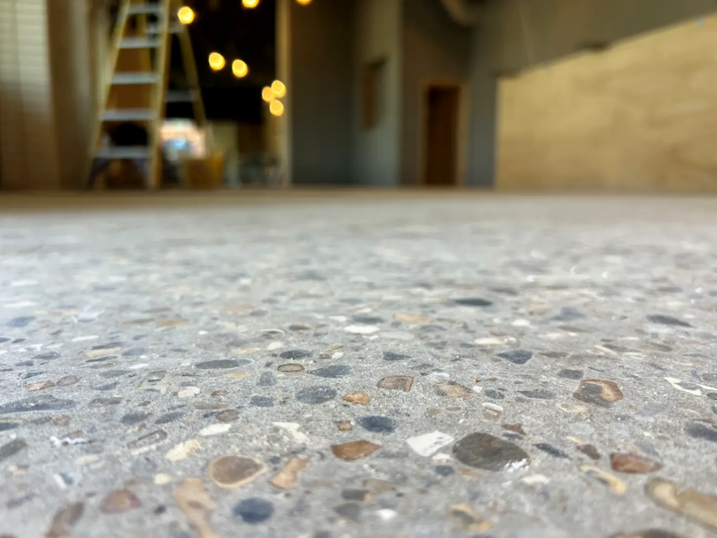 Exposed aggregate polished concrete floor at Always Gladice, Brent Cross