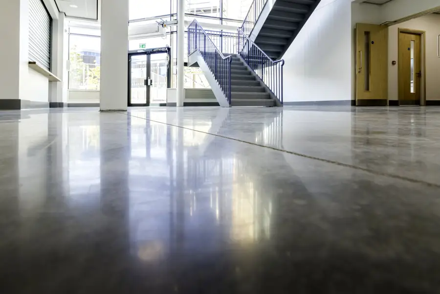 Colour-hardened polished concrete floor at Samuel Rhodes School, Highbury