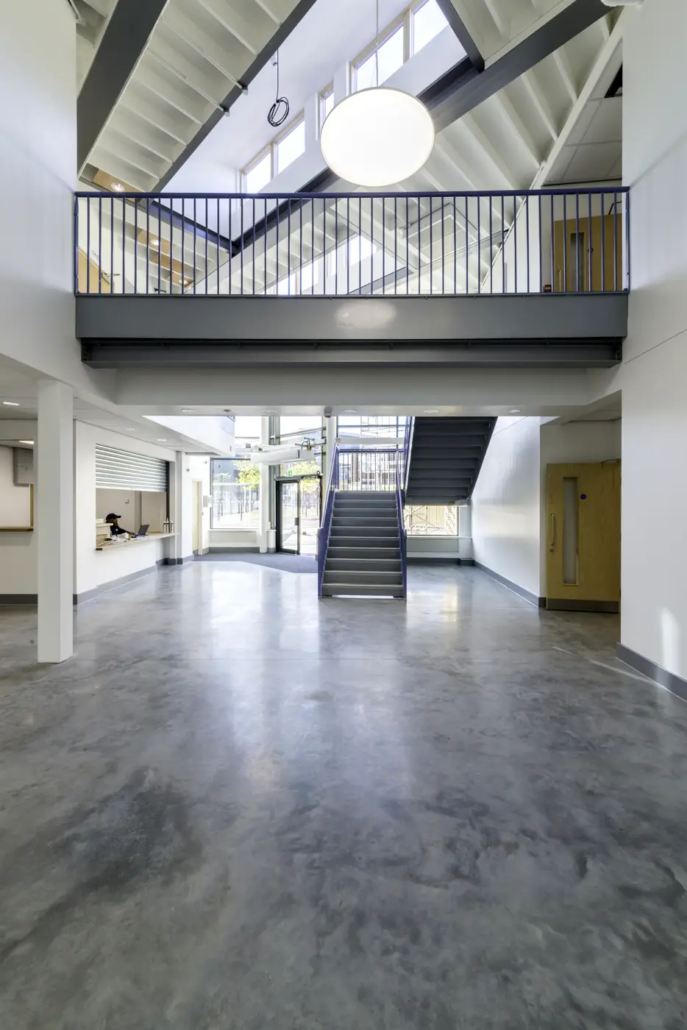 Colour-hardened polished concrete floor at Samuel Rhodes School, Highbury